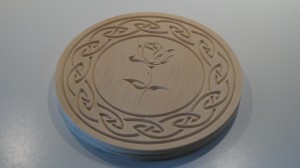 Coaster mad with v-bit carving.