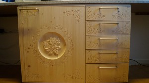 Cabinet door and drawers.